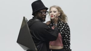 will.i.am applies makeup to Anja Nissen